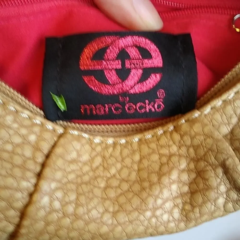 Marc ecko Pebbles foe leather tan clutch wristlet